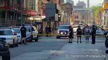 Young man killed in daylight shooting in downtown Toronto, boy and woman seriously injured