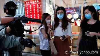 Hong Kong police arrest hundreds and fire pepper pellets amid fresh unrest