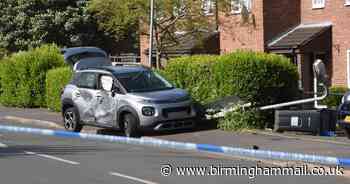 Wrecked car inside police cordon as street sealed off