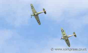 Spitfire and Hurricane fly low over York