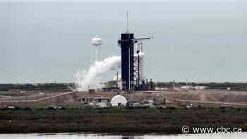 Historic launch of SpaceX rocket delayed over lightning fears