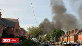 Thick black smoke seen as Wrexham landfill site burns