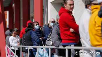 Number of Americans on jobless benefits inches down for 1st time since pandemic began