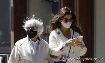 Bernie Ecclestone, 89, and his pregnant wife Fabiana Flosi, 44, stroll hand in hand