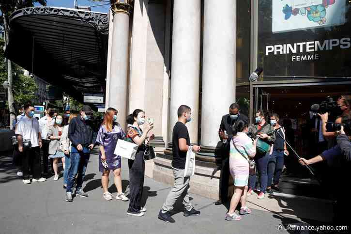 Shoppers revel as Printemps department store reopens in Paris
