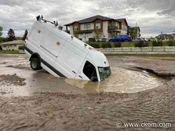 City of Saskatoon van ends up in sinkhole after crew responds to water main break - News Talk 650 CKOM