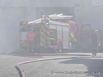 Smoke spotted around Farnworth after fire at waste processing site