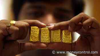 Gold price dips marginally to Rs 46,929, silver gains