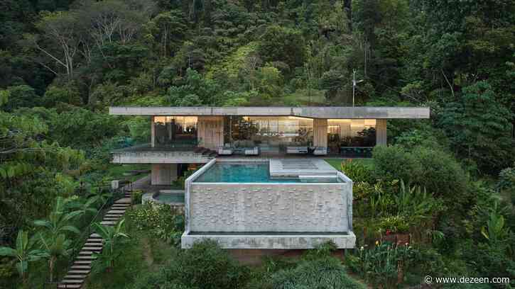Concrete swimming pool protrudes from Art Villa holiday home in Costa Rican jungle