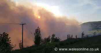 Two mountain fires merge into one in the Rhondda