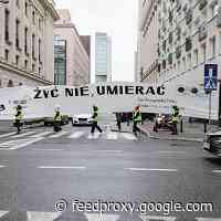 Polish Government Fines Artists Who Protested At Parliament, Then Backs Down