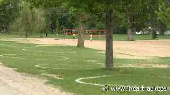 Ottawa paints physical distancing circles at Mooney's Bay - Newstalk 1010 (iHeartRadio)