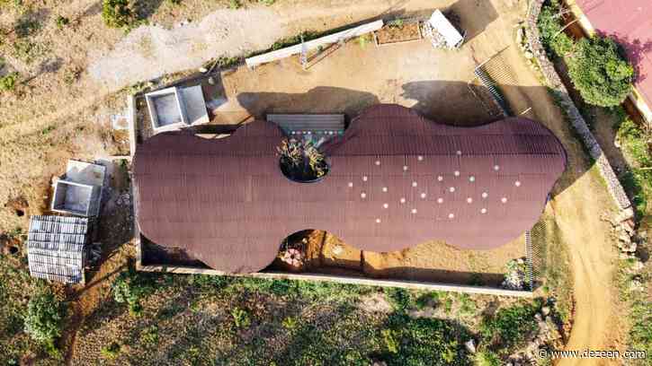 Undulating roof shades Bó Mon preschool by Kientruc O in rural Vietnam