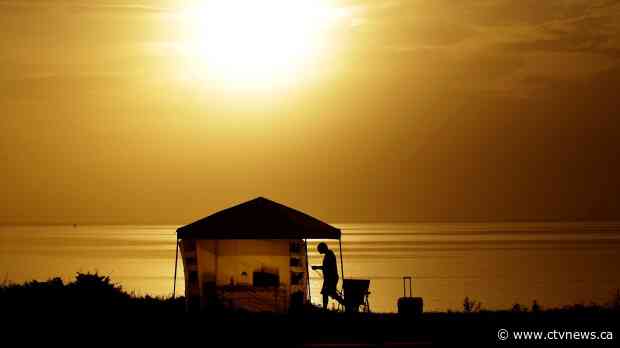 Two astronauts climb aboard SpaceX rocket for historic flight