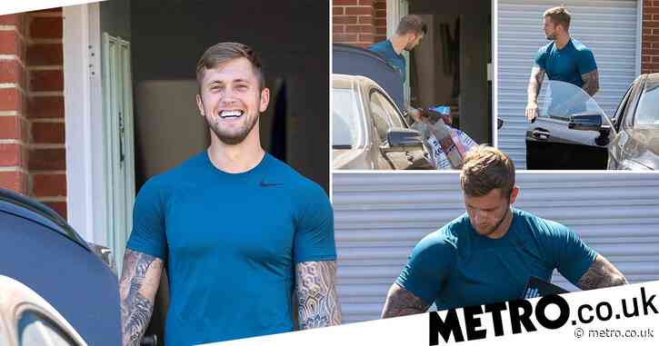 Dan Osborne is all smiles as he returns home after Jacqueline Jossa denies split rumours