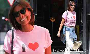Melanie Sykes, 49, looks casually chic in an 'I love social distancing' slogan T-shirt