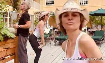 Harry Hamlin hilariously ignores Lisa Rinna as she twerks and dances around him