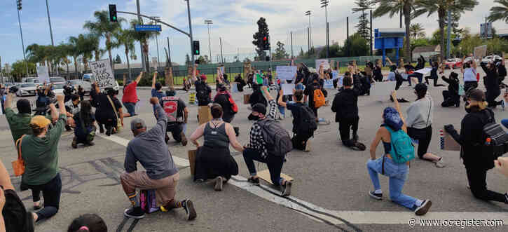 Peaceful day of protests in Orange County leads to uneasy night