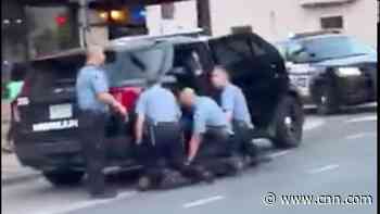 New video appears to show 3 officers kneeling on Floyd