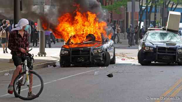 Police cars burn, buildings ransacked as protests across U.S. turn violent