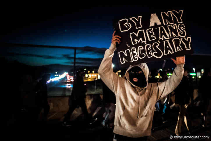 Photos: Turbulent day careens into a violent night in Southern California