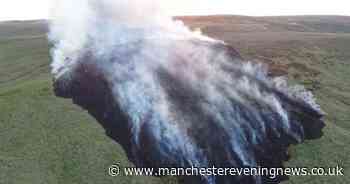 Huge fire tears through moorland north of Bolton - a barbecue could be to blame - Manchester Evening News