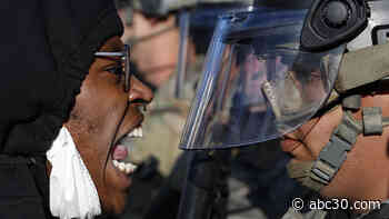 PHOTOS: Powerful images show clashes with police, demonstrators during protests over George Floyd's death
