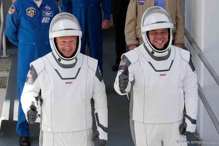 SpaceX’s astronaut-riding Dragon arrives at space station