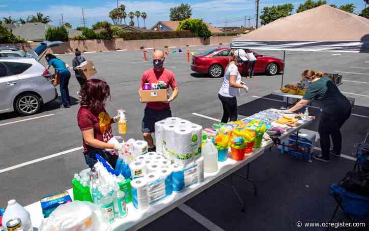 Generous drivers stop by Huntington Beach church with donations for single parents in need