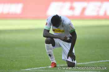 Marcus Thuram takes a knee after scoring in Bundesliga clash - St Helens Star