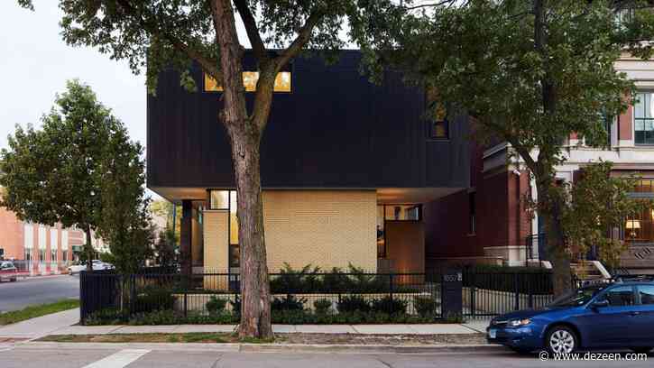 Studio Dwell stacks black volume onto brick structure to form top-heavy Hermitage Residence