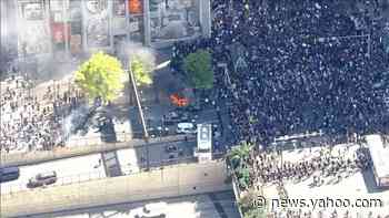 Protesters in Philadelphia set police vehicle on fire