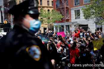 Protesters at White House push through barricade, climb on top of Secret Service vehicles