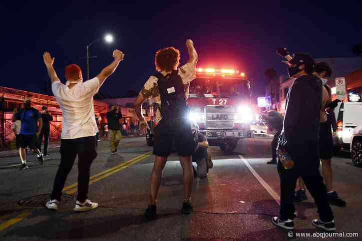 Unrest overshadows peaceful US protests for another night