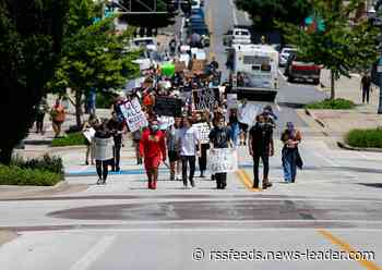 Protesters march in downtown Springfield