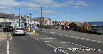 Cyclist spat at from passing car while riding along the coast