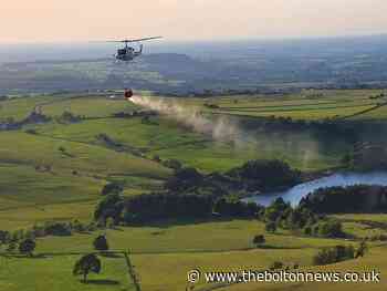 Firefighting helicopter forced to land after drone flown over raging moor fire