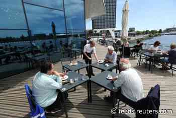 Dutch bar terraces fill quickly as lockdown ends