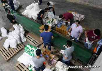 Lebanese food aid drive underlines pain of economic collapse
