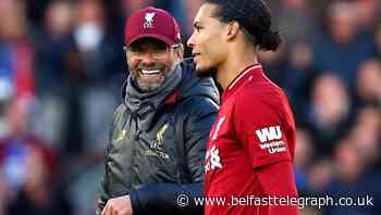 Robertson hails Van Dijk and Klopp as world beaters