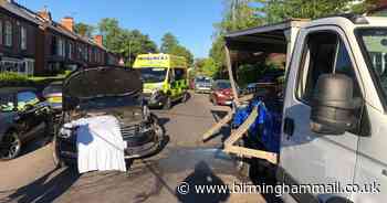 Milkman injured after being trapped between two vehicles in crash