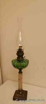 An Early 20th Century Oil Lamp The Green Glass Reservoir