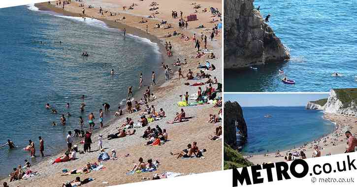 Durdle Door owner blames government for packed beach where people were injured