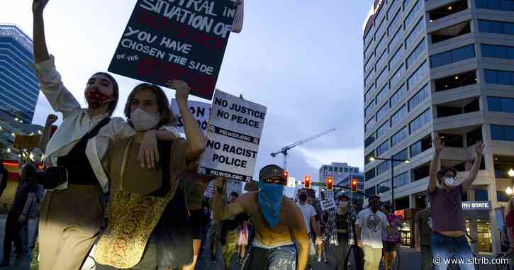 Peaceful protesters march through Salt Lake City streets after mayor announces new one-week curfew