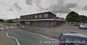 Masked thug storms pharmacy and threatens worker with knife