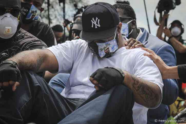 On the spot where George Floyd died, his brother urges calm