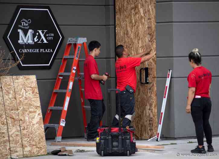 Garden Grove orders 6 pm curfew, Main Street owners board storefronts