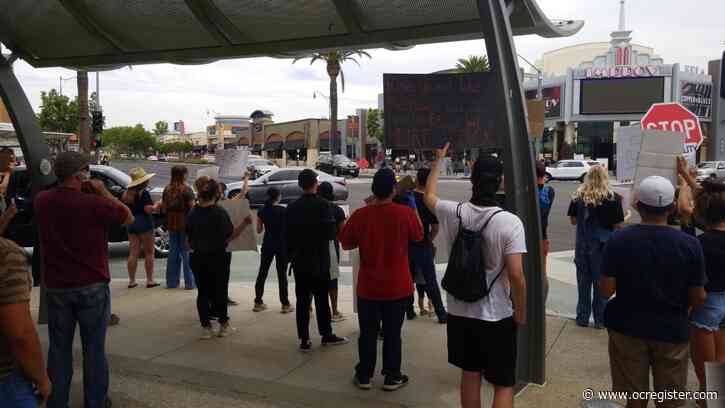 Demonstrators chant, carry placards in downtown Brea in protest of the killing of George Floyd