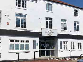 York dentist says returning to business as normal is 'madness'