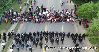 60 cops kneel to support George Floyd as protesters left stunned